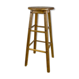Round vintage wooden bar stool