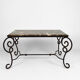Table basse en fer forgé patiné et marbre, circa 1940