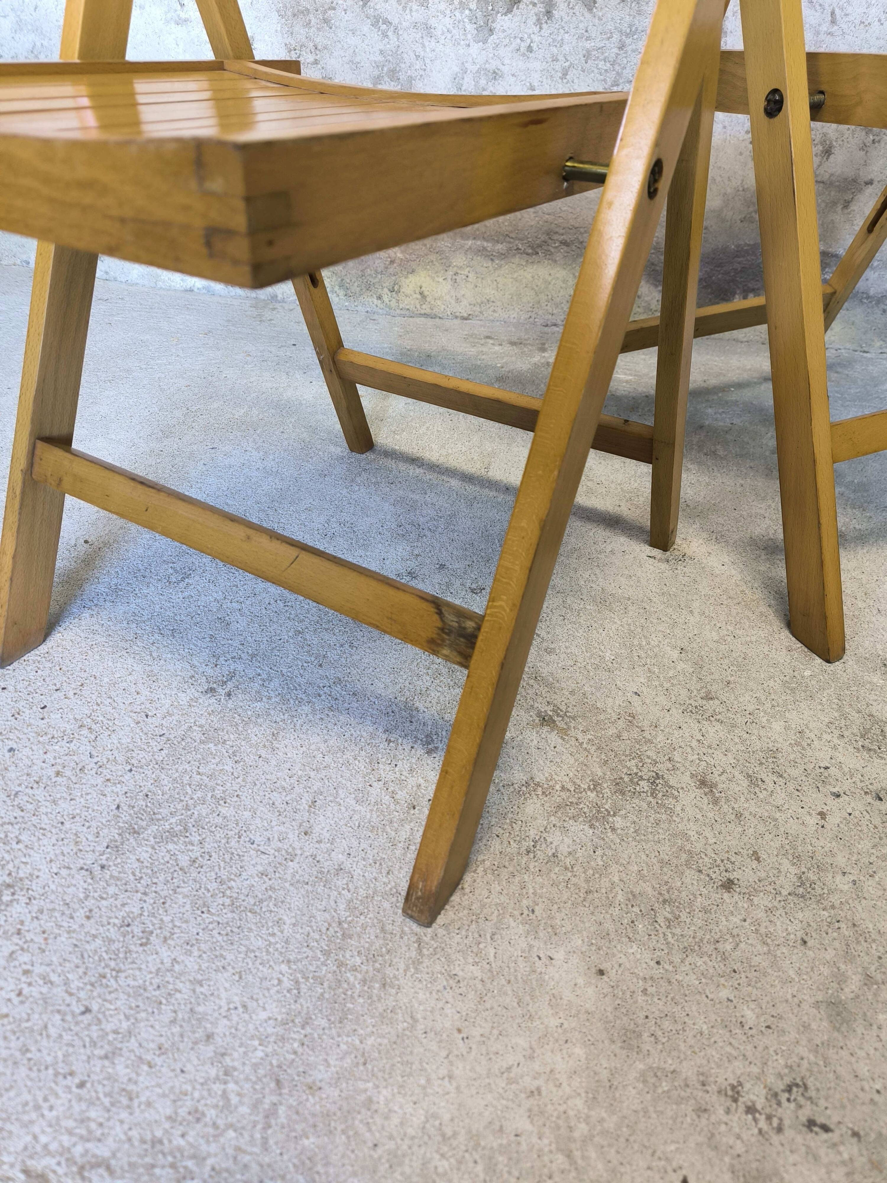 Pair of vintage folding wooden chairs