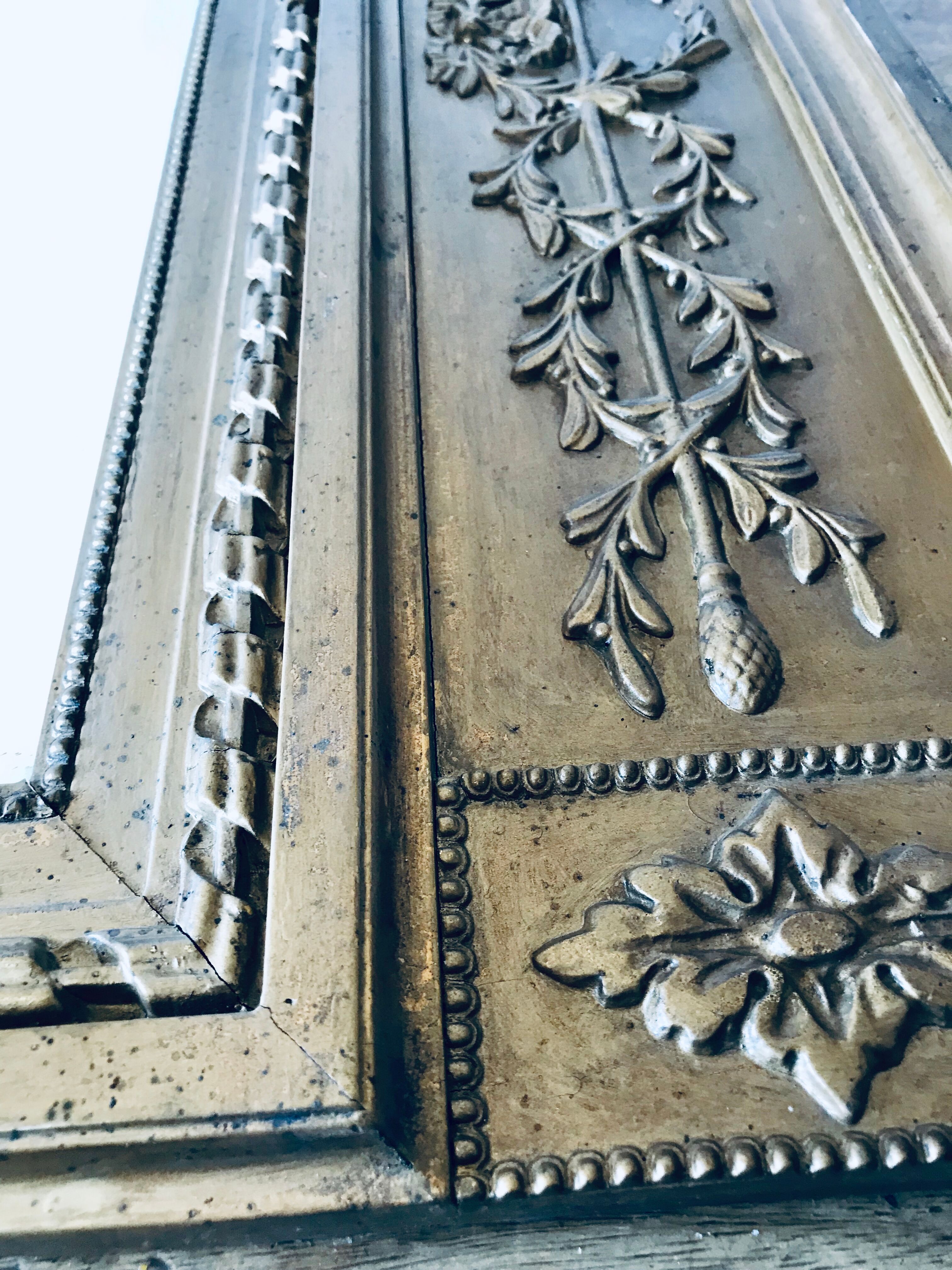 Gilded and beveled pier mirror 88x58cm