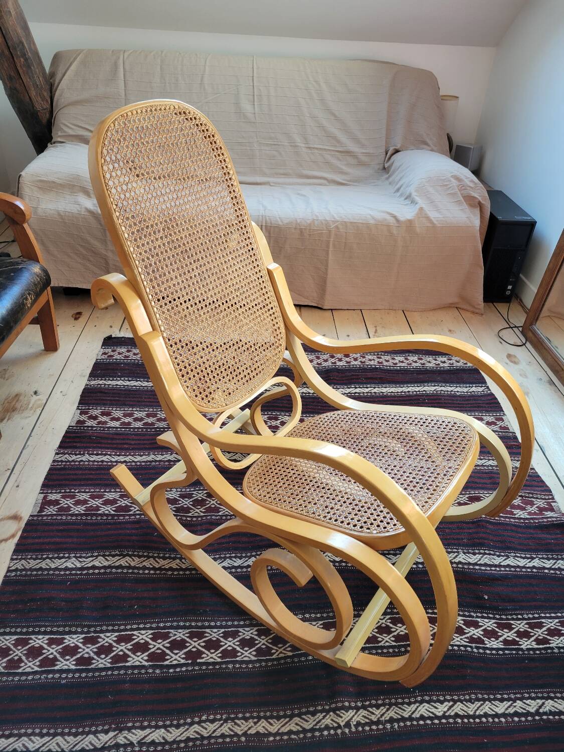 Rocking chair in arched wood and cane