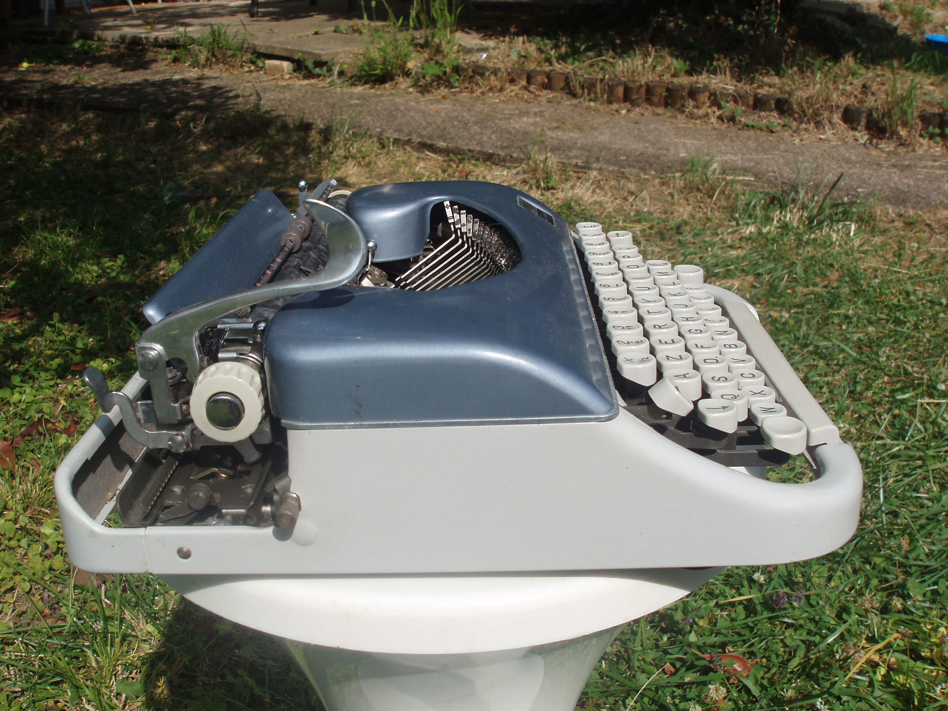 Typewriter blue japy script  with manual and carrying case