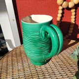 Green glazed ceramic pitcher