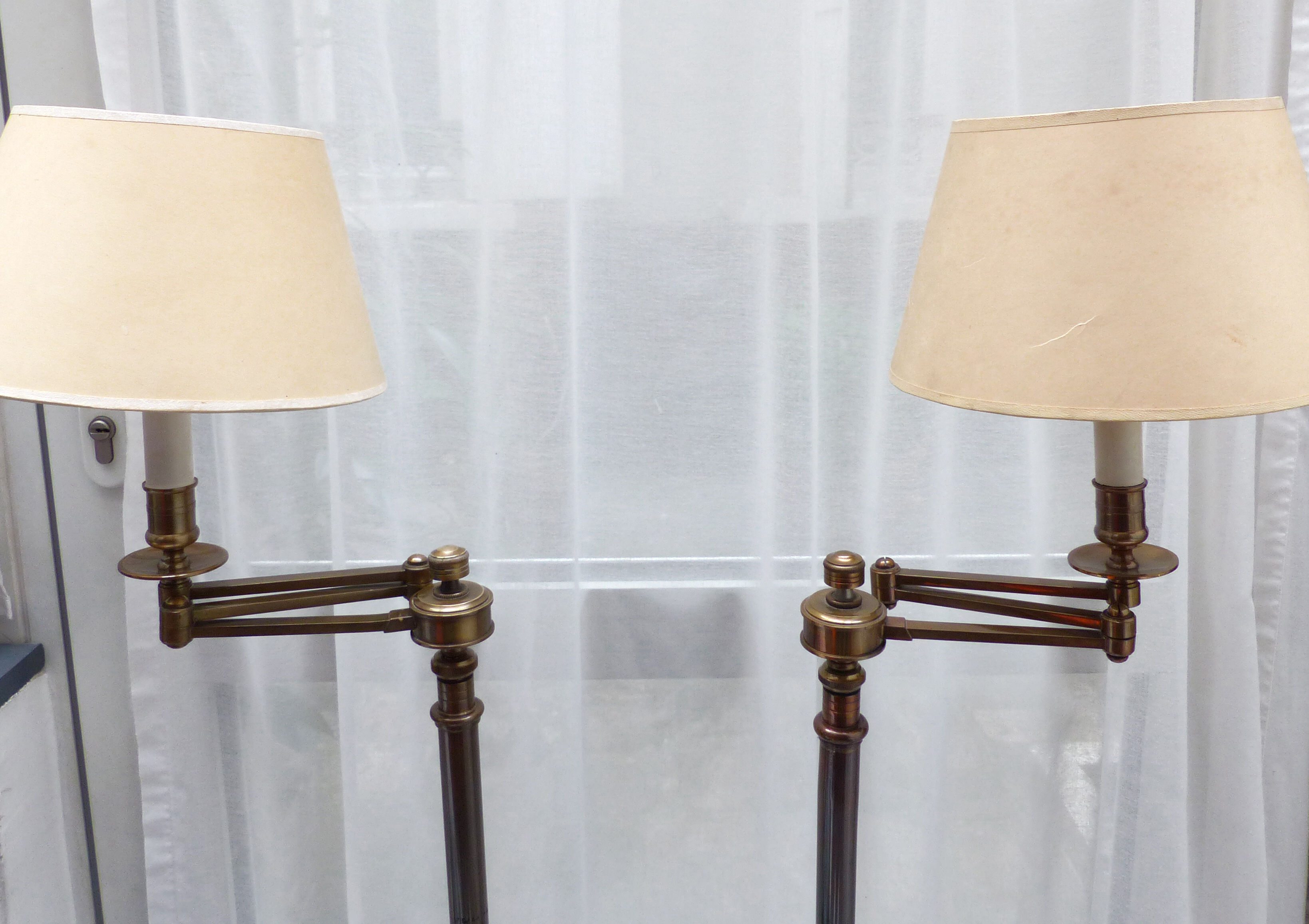 Pair of vintage e-readers with articulated arms