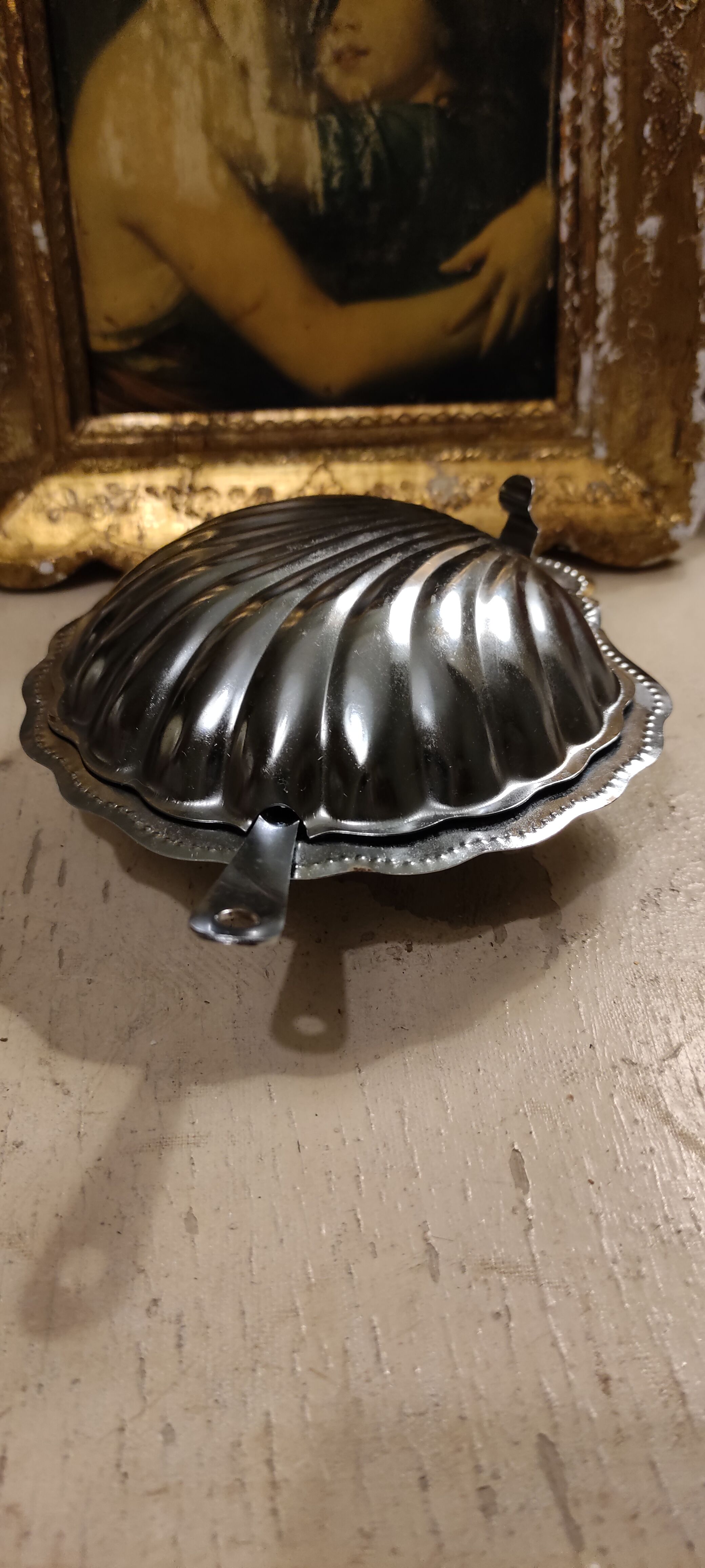 Vintage silver metal butter in shell shape