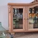 Vintage display cabinet in light wood