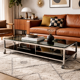 Table basse design vintage chrome et verre fumé noir sur roulettes