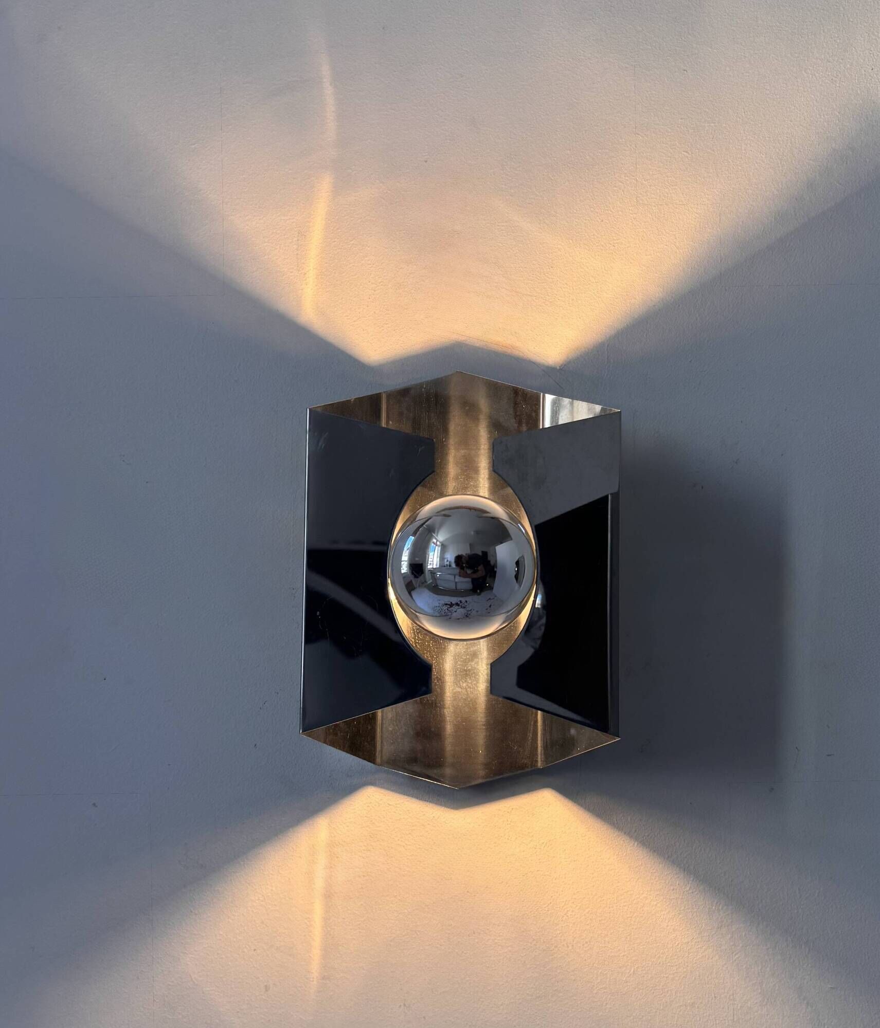 Pair of vintage geometric wall lights in chrome metal, France 1970.