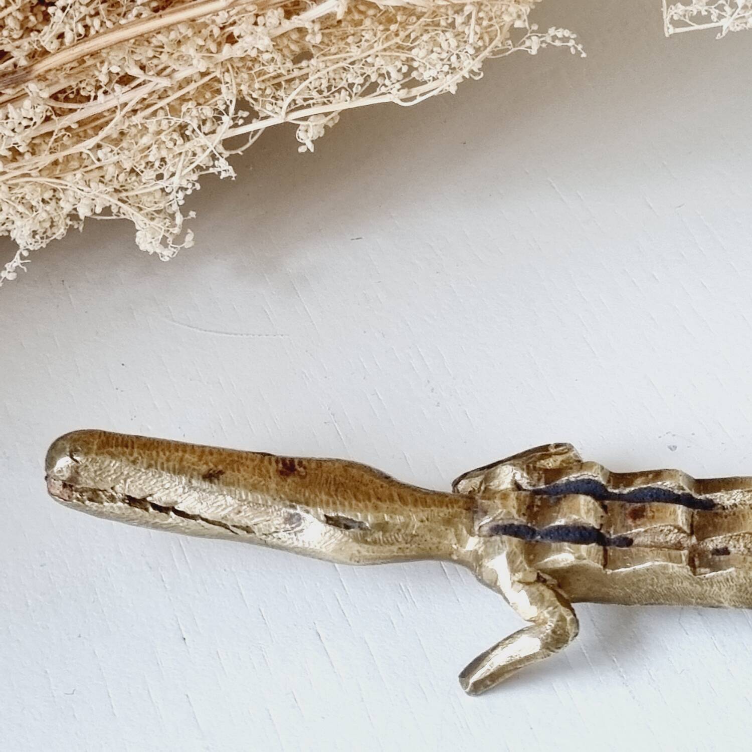 Stylized brass crocodile