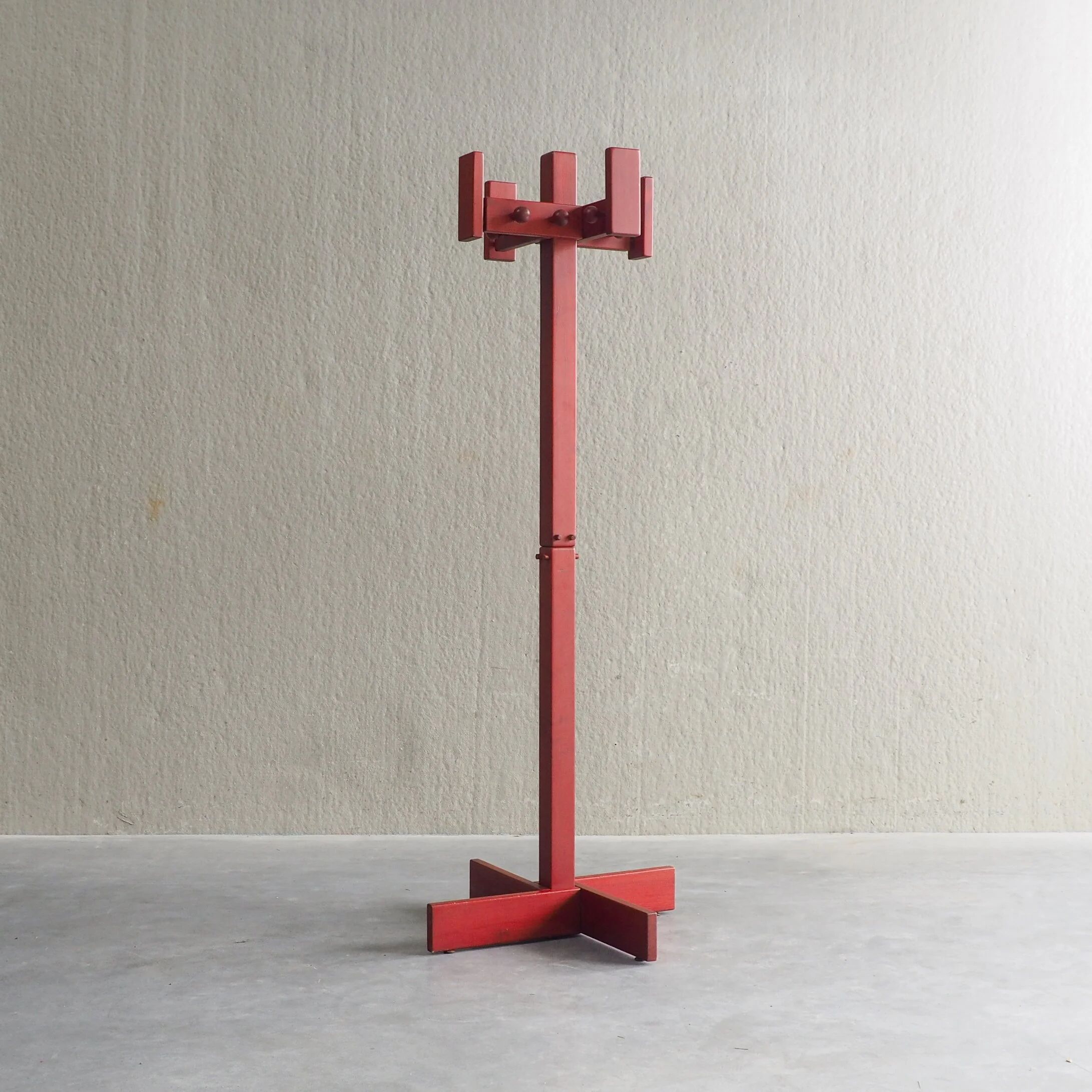 Postmodern red stained pine wood coat hanger
