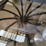 1970s modernist coffee table in smoked glass and metal.