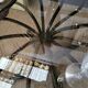 1970s modernist coffee table in smoked glass and metal.