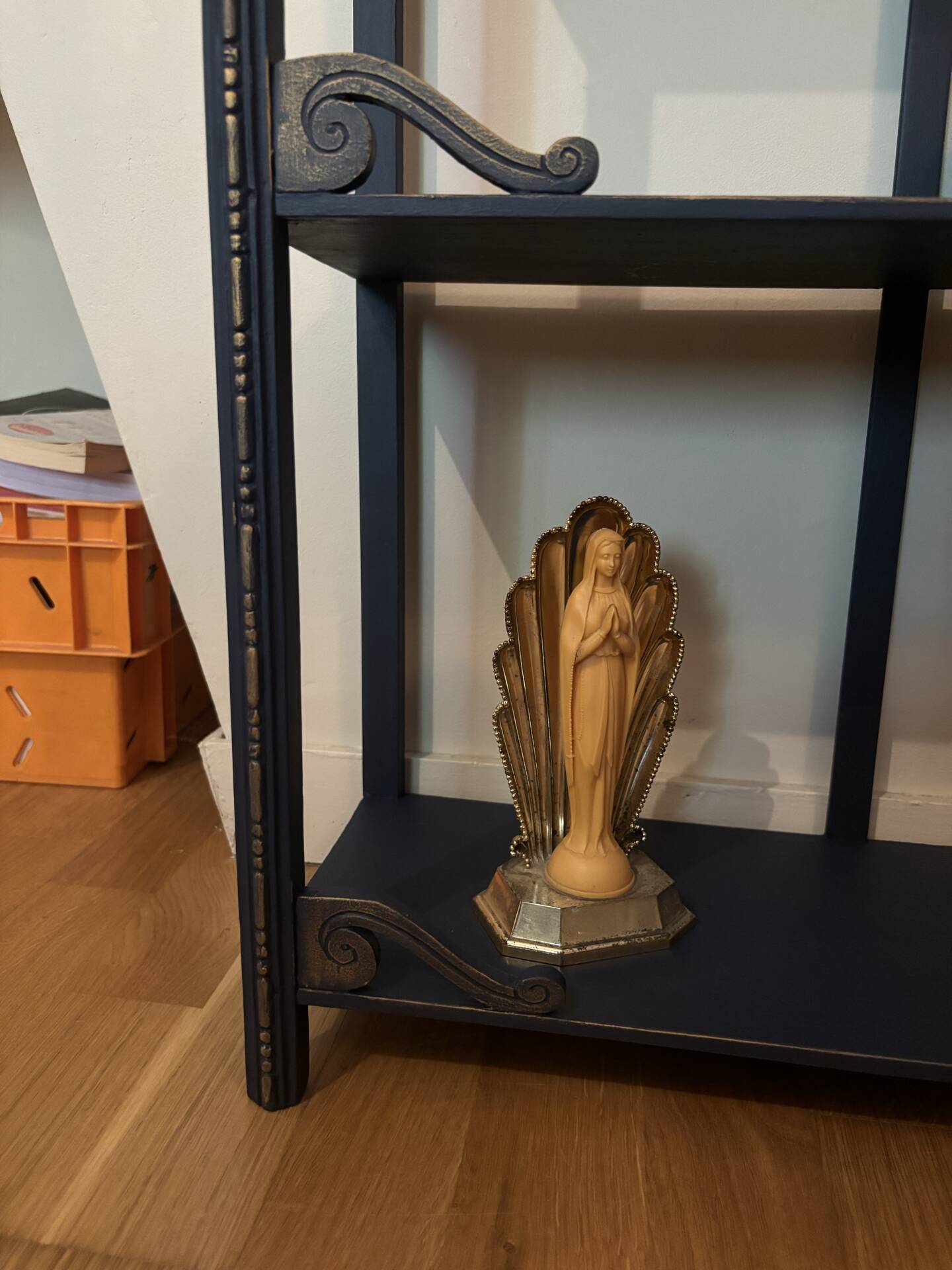 Small vintage shelf reimagined in midnight blue & gold, curiosity cabinet.
