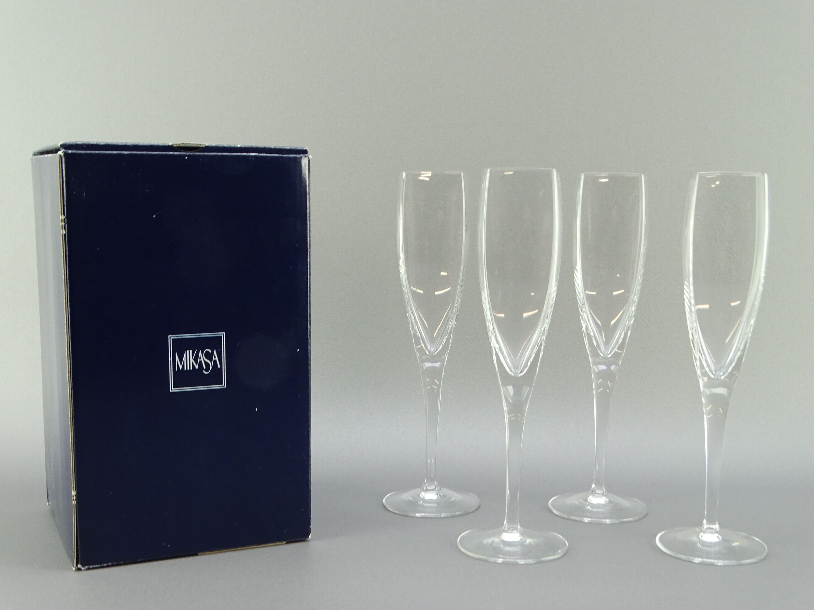 Series of 4 crystal champagne flutes model Mikasa clear panache