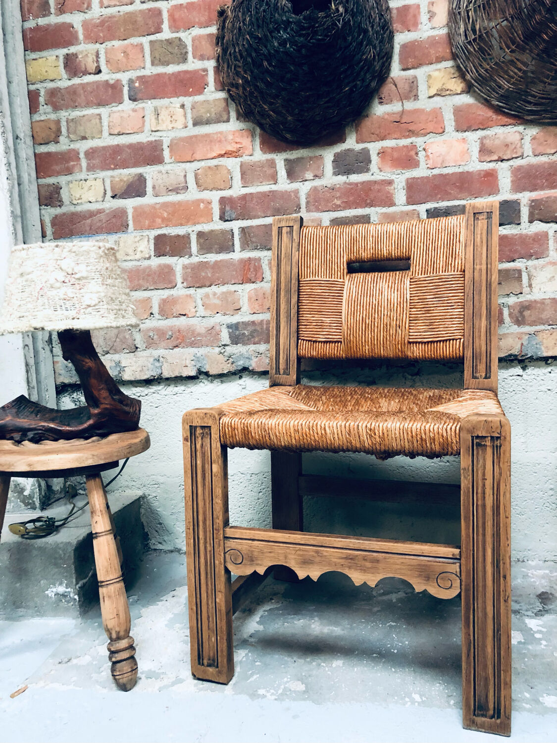 Old straw brutalist chair