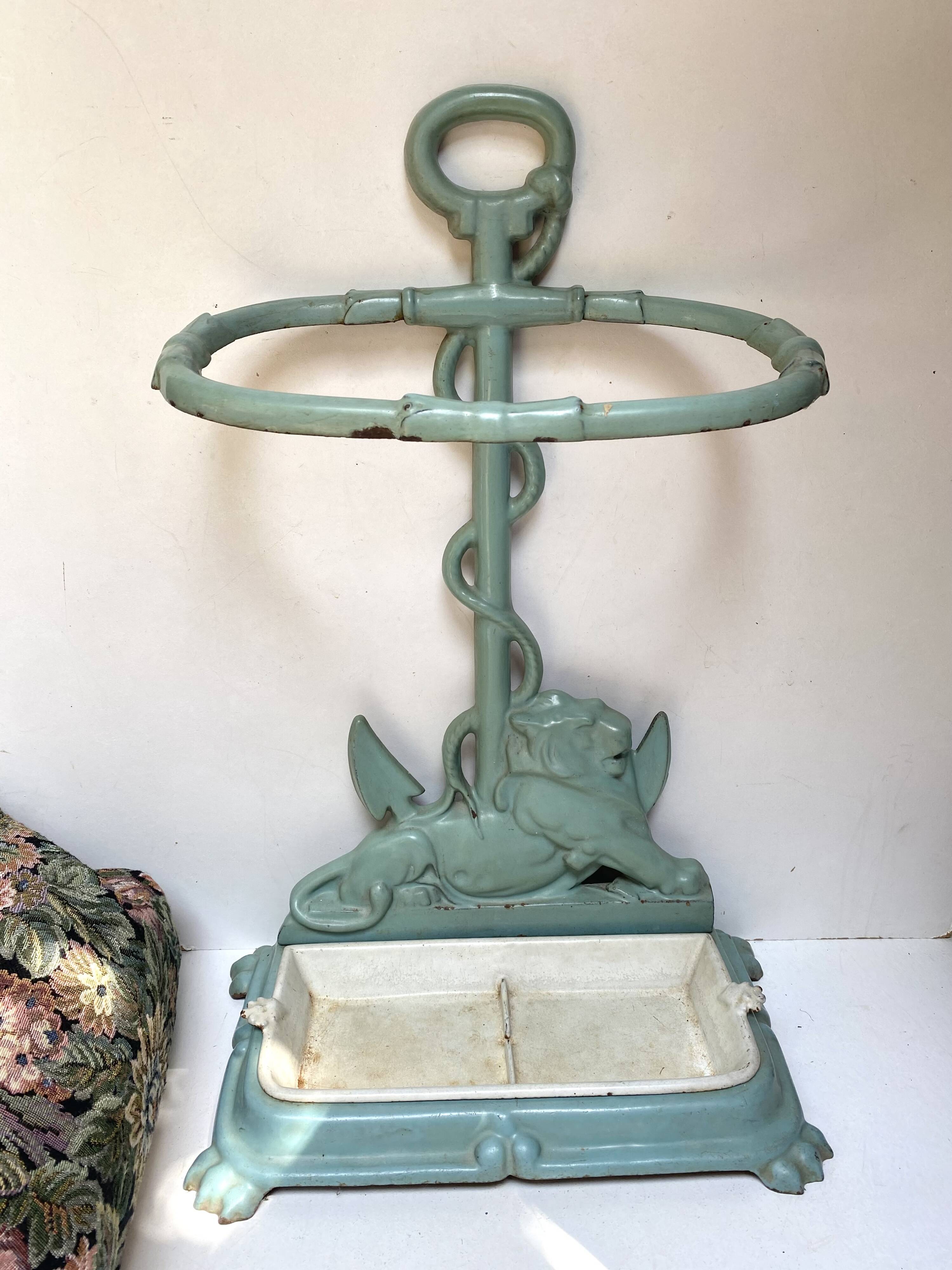 Enameled cast iron umbrella stand from the early 20th century