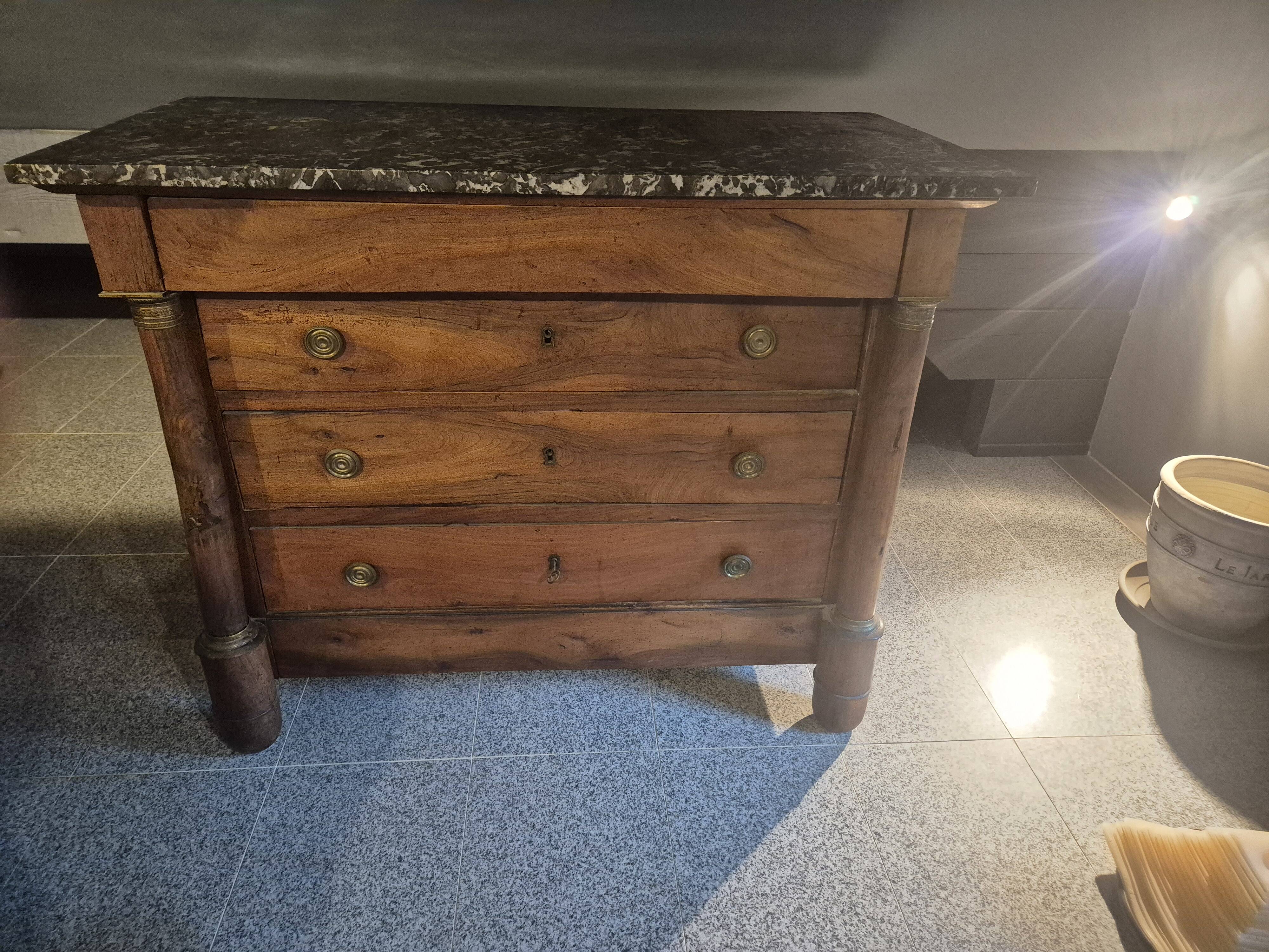 Empire period walnut chest of drawers