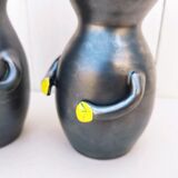 Pair of ceramic anthropomorphic vases