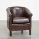 dark cowhide club chair in English style