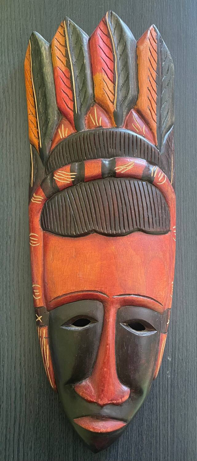 Handmade wooden mask from the Dominican Republic.