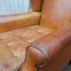 English fawn leather armchair with ears Chesterfield club