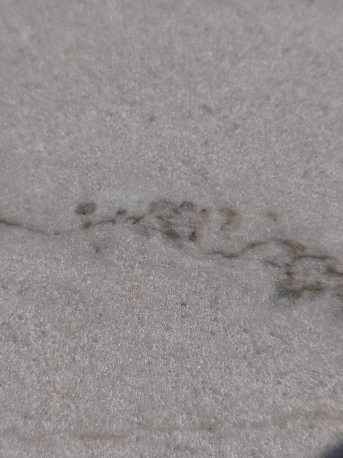 Marble bistro table with cast iron legs in Parisian café style