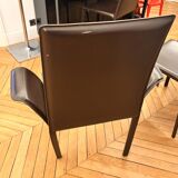 Many brown leather chairs "Roche Bobois"