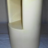 Cylindrical fiberglass bedside table from the 60s
