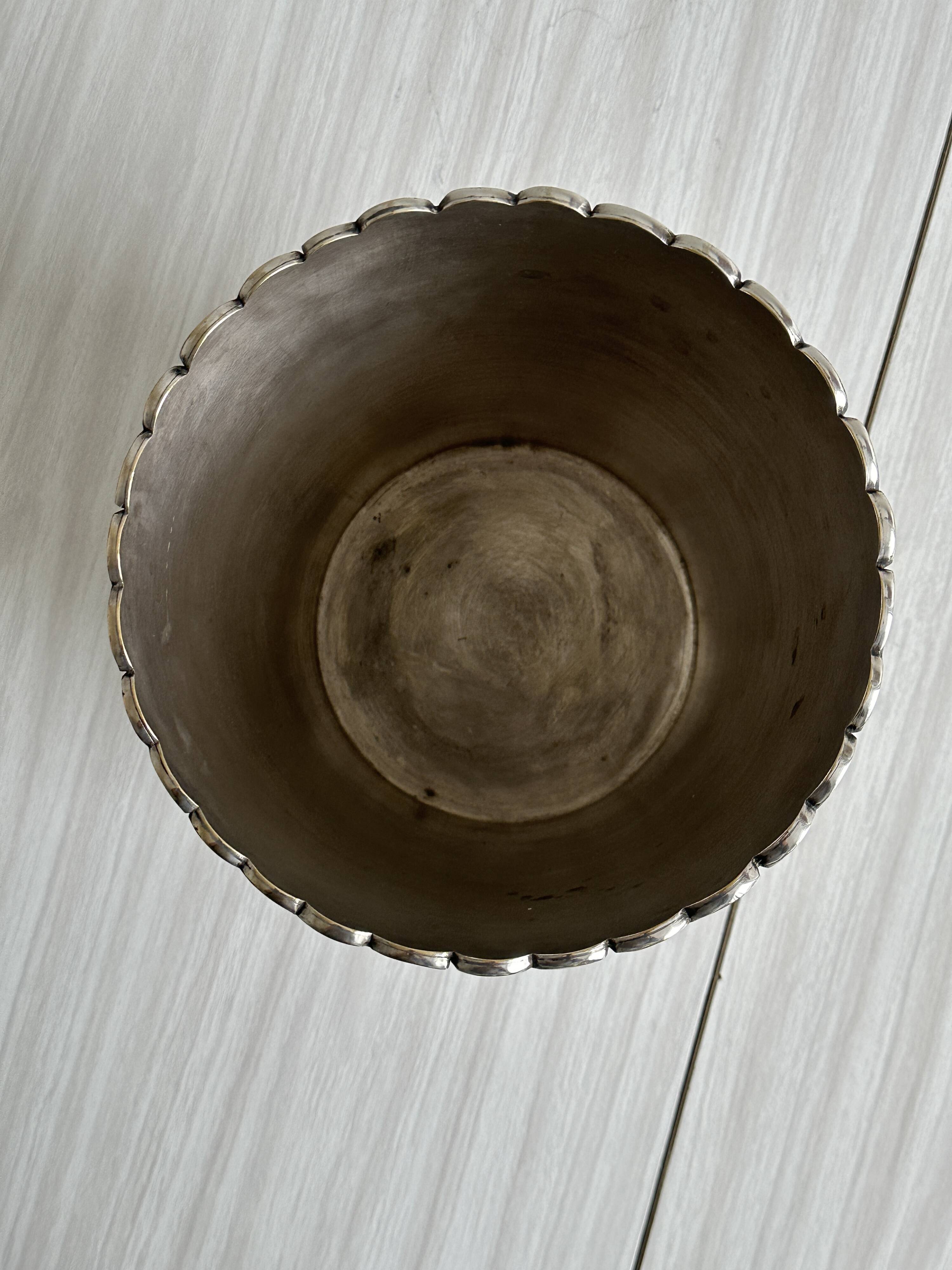 Antique champagne bucket in shiny silver metal