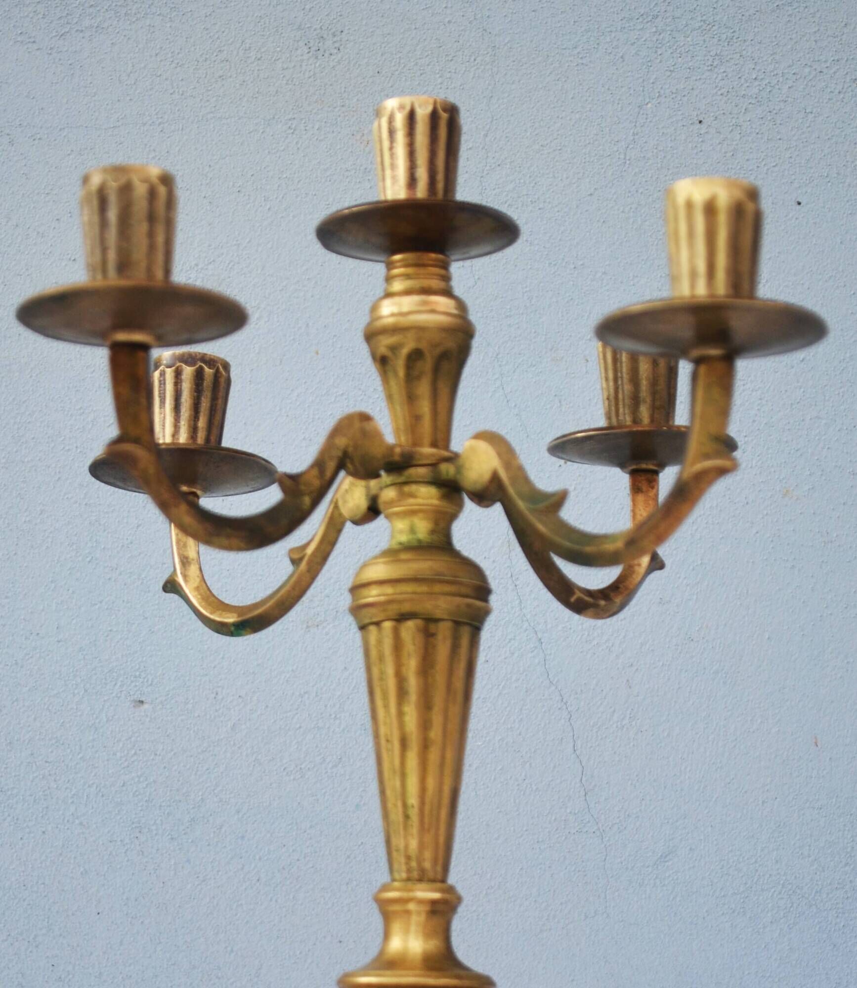 Solid brass candle holder with 5 candles and 4 arms