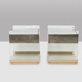 Pair of bedside tables or sofa ends in brass, glass and mirror. 1970s.