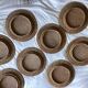 Set of round woven rattan and canework coasters