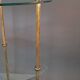 Neoclassical style 3-shelf corner cupboard in gilded brass, Circa 1950/1960.