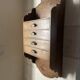 Antique piece of furniture with walnut drawers to hang