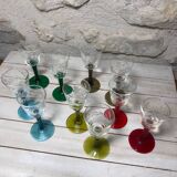 Antique and rare! Sold in a set of 12 colorful twisted stemmed glasses engraved with flowers and leaves