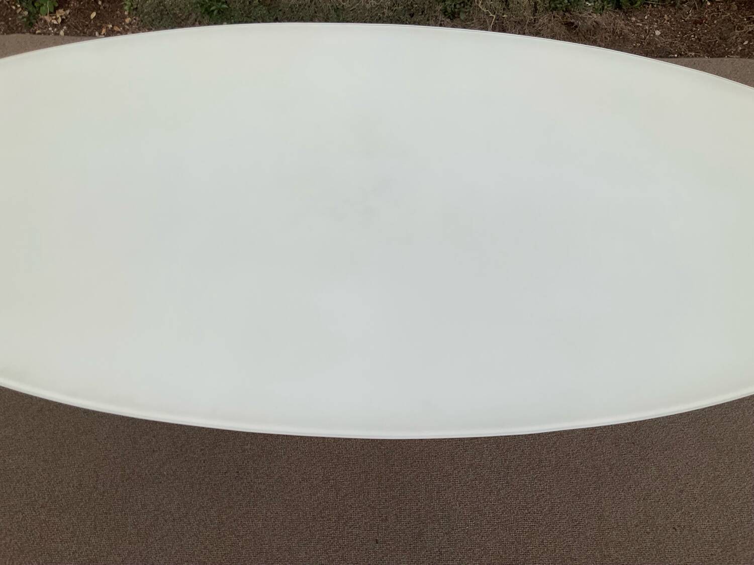 Oval designer dining table in frosted glass and brushed stainless steel