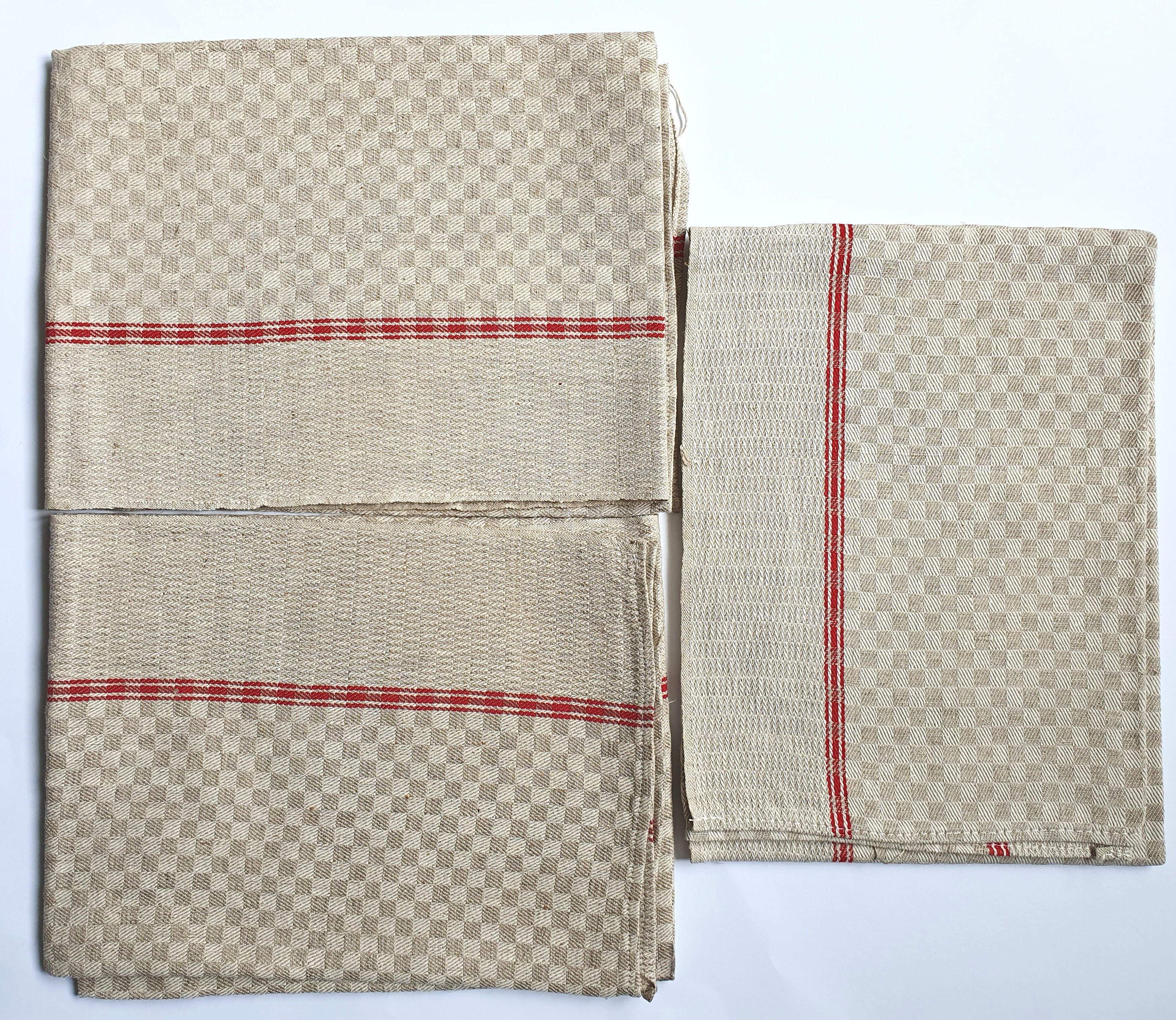 Set of three old tea towels