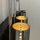 Pair of vintage wall lights, chrome-plated metal and blackened oak, France, 1970