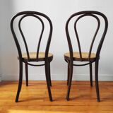 4 antique curved wood and cane chairs
