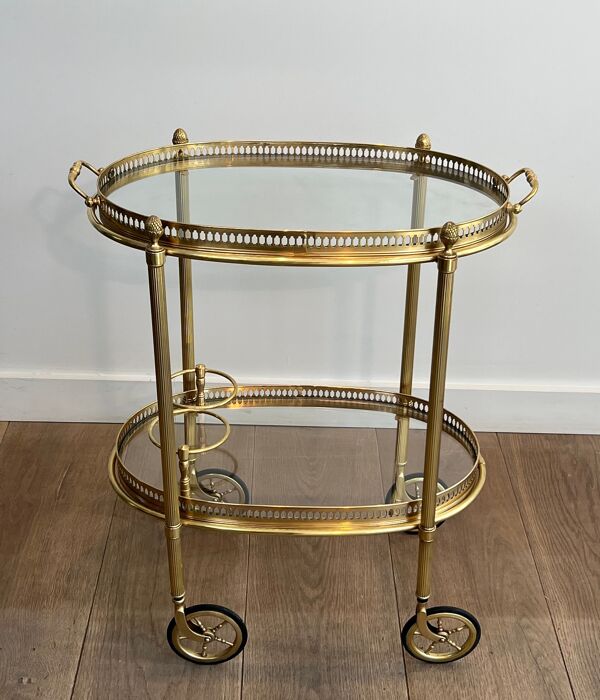 Petite table roulante ovale en laiton à double plateaux amovibles de la Maison Bagués