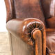 Dark brown sheep leather wingback armchair