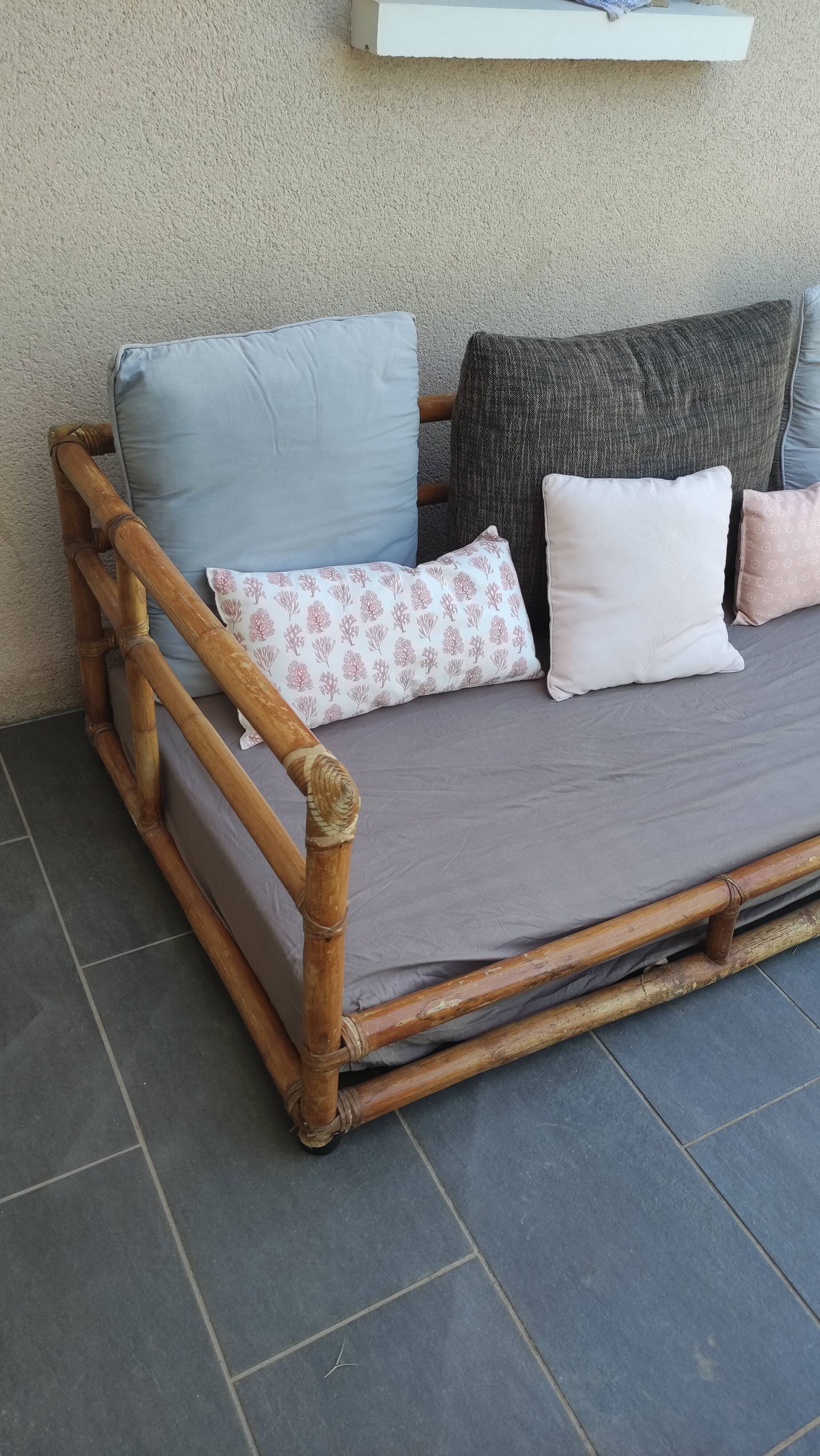Large vintage rattan sofa bed