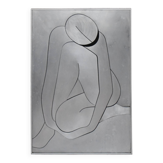 Silhouette of a seated woman in metal cut out on panel, 1970s