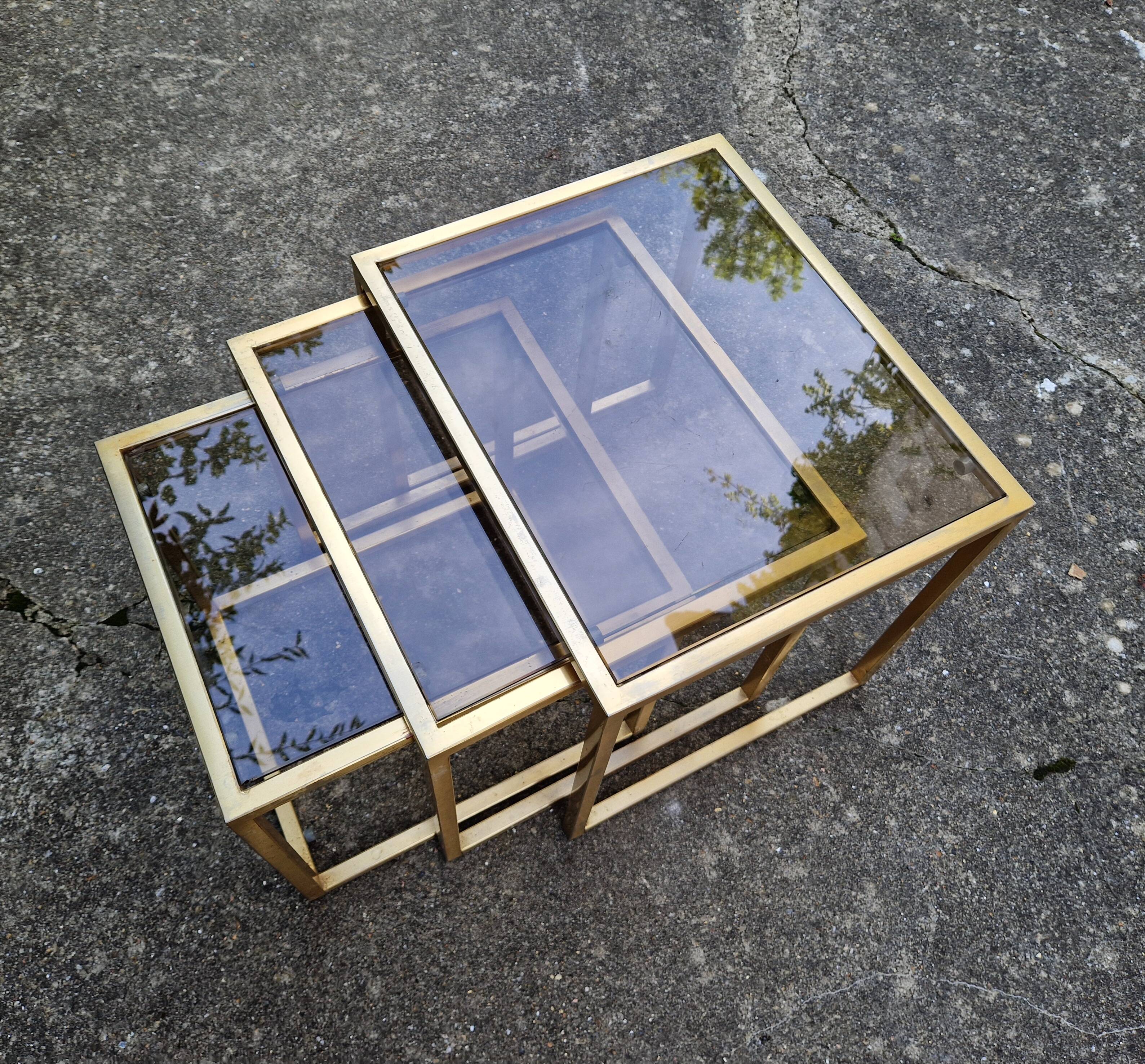 Vintage 1980s gold metal and smoked glass nesting tables