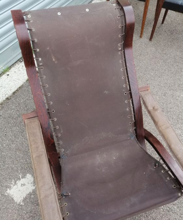 Leather siesta chair by Ingmar Relling and rests foot