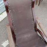 Leather siesta chair by Ingmar Relling and rests foot