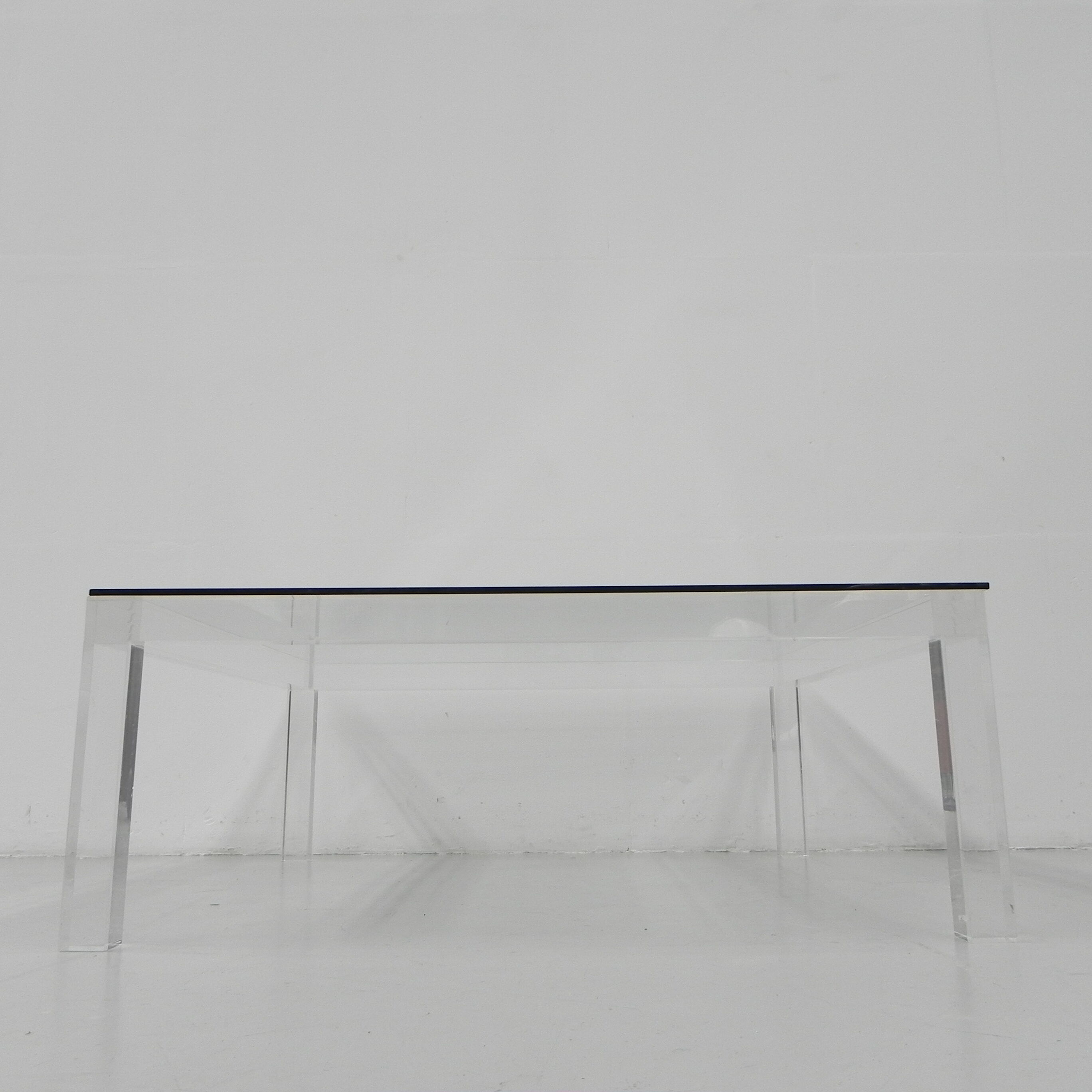 Vintage coffee table on perspex legs