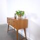 Vintage teak Danish chest of drawers with high slanted legs, side table, sideboard.