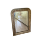 Golden mirror with mouldings