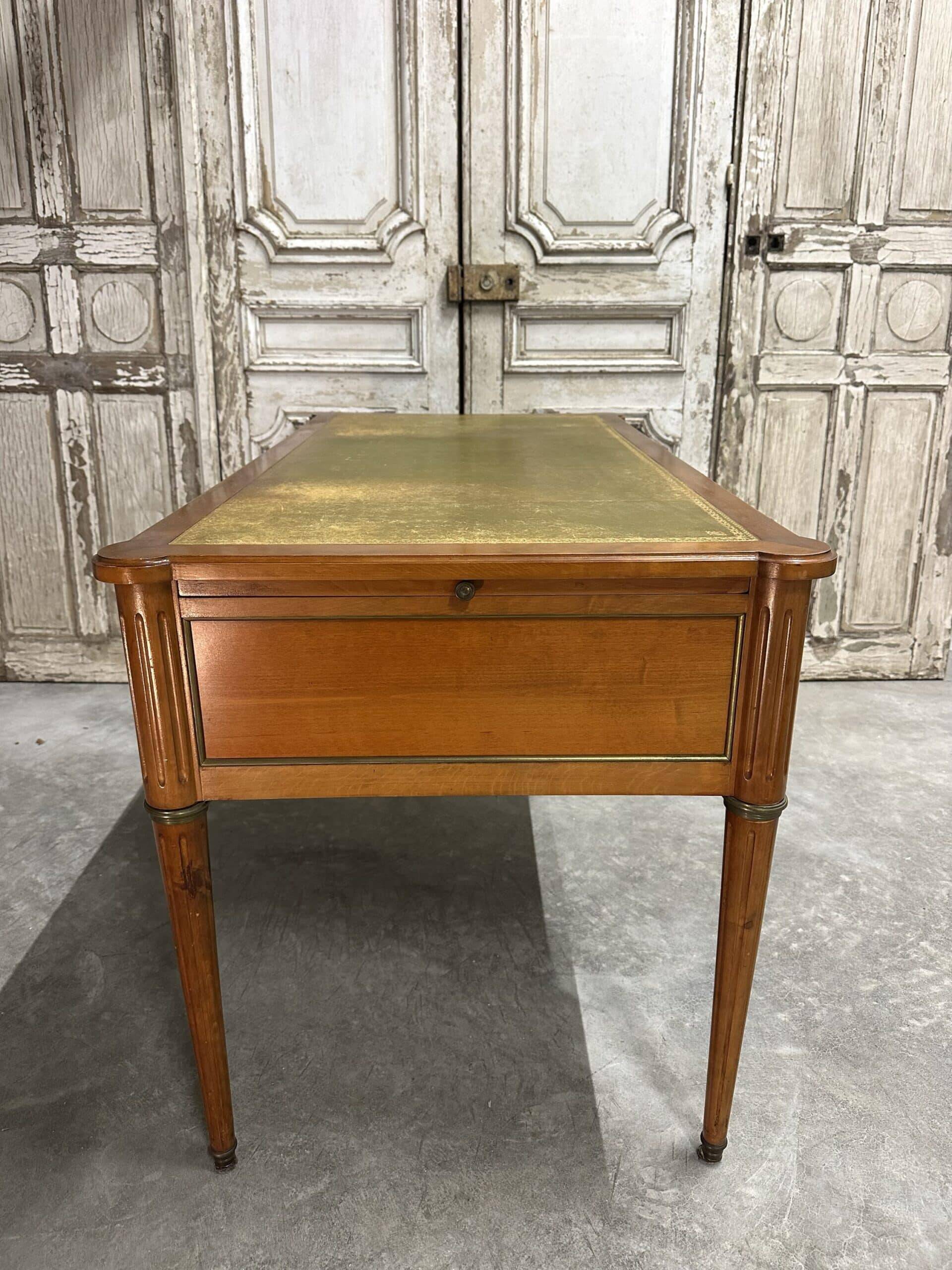 Louis XVI style flat desk in cherry wood from around 1960.